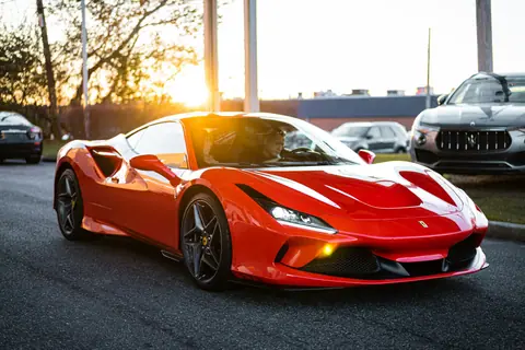 Red Ferrari at sunset