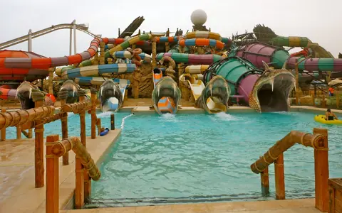 Pool and slide towers at Yas Waterworld
